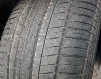 Tire showing uneven tread wear